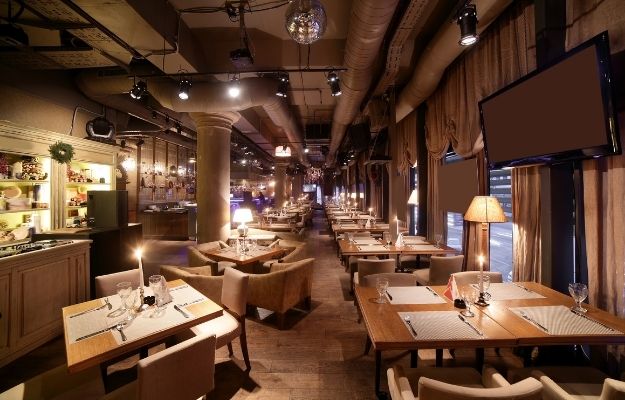 the layout of restaurant with organized decoration | What is Cross-Promotion? | Cross-Promotion Ideas to Boost Your Marketing Campaign